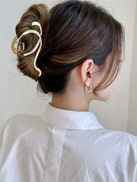 Gylden Metal-HÄrklemme med Snoet Design