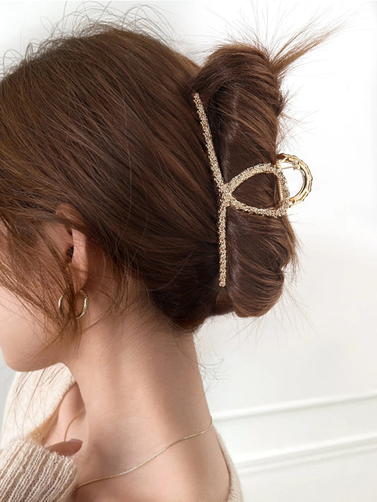 Gylden Metal-HÄrklemme med Snoning & MÞnster