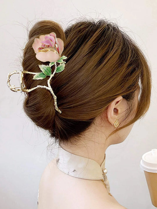 Gylden HÄrklemme med LyserÞd RoseGylden HÄrklemme med LyserÞd Rose