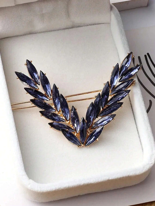 Gylden HÄrspÊnde med BlÄ Facetperler