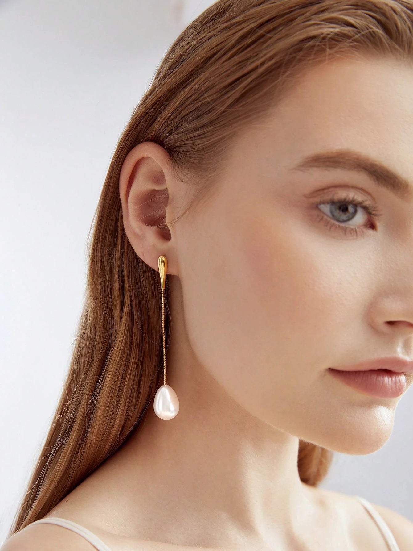 Golden Earrings with White Pearls