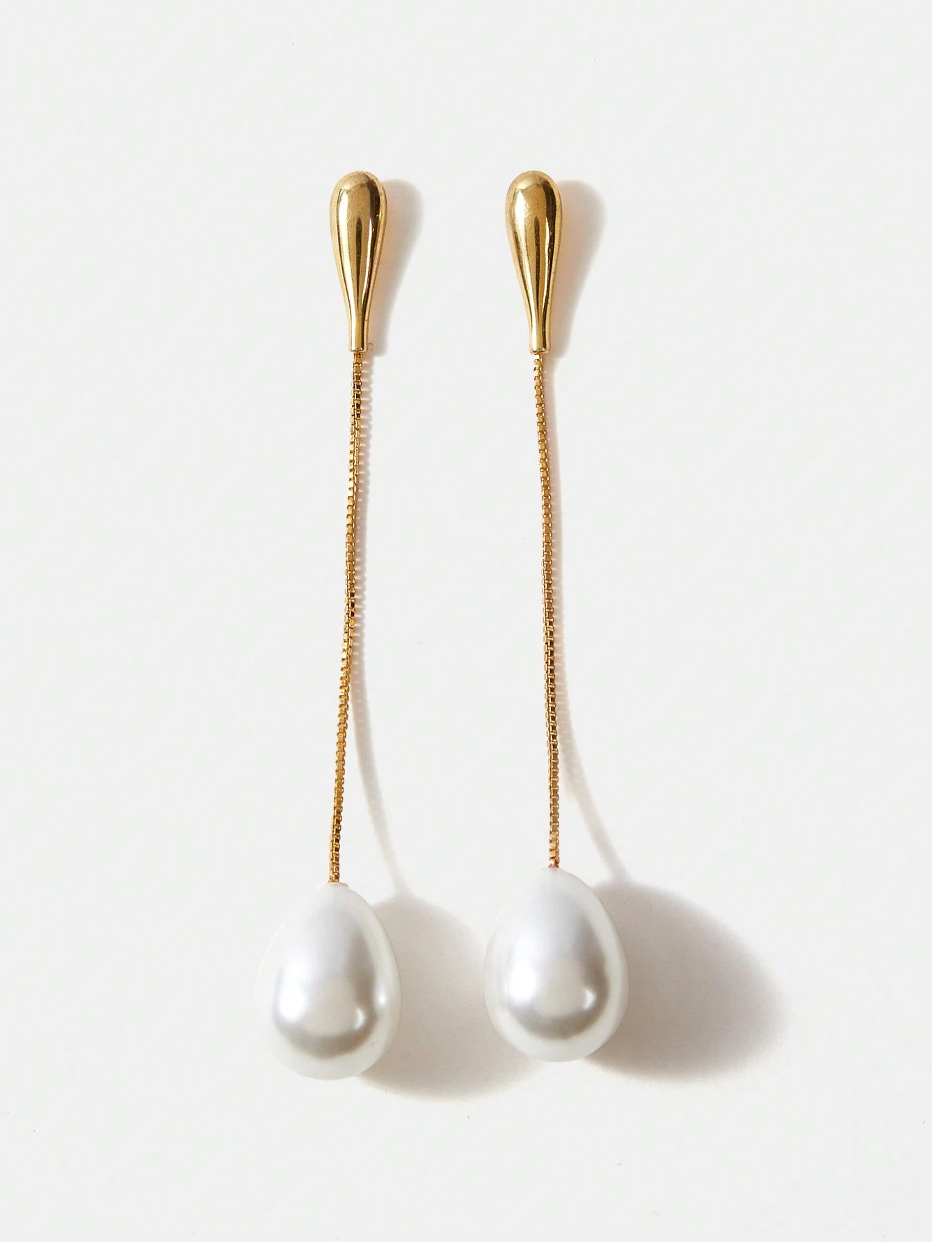 Golden Earrings with White Pearls