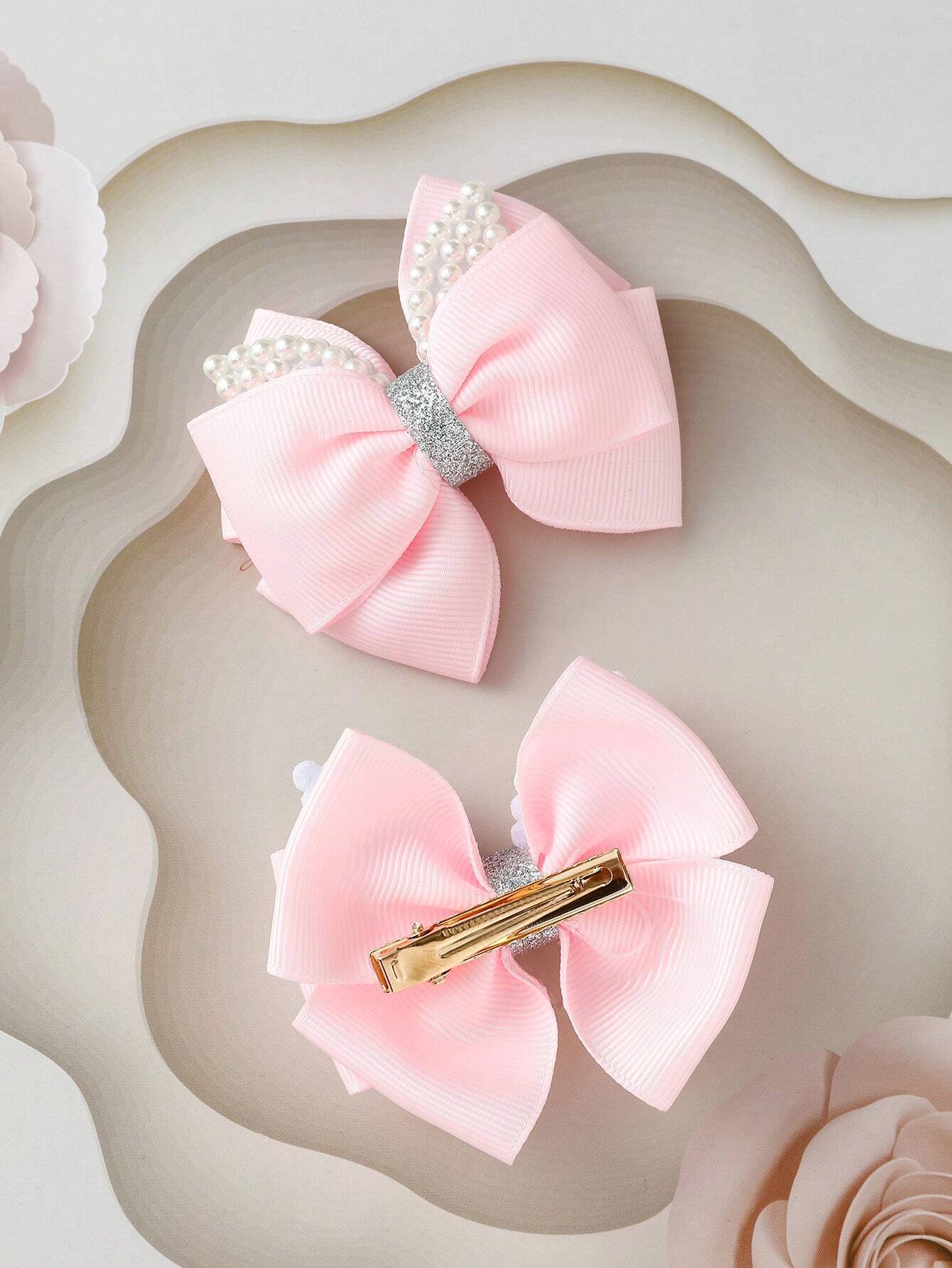 Sæt med 2 Lyserøde Hårsløjfer med Hvide Perler