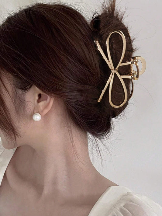 Gylden Metal-HÄrklemme med SlÞjfe-Design