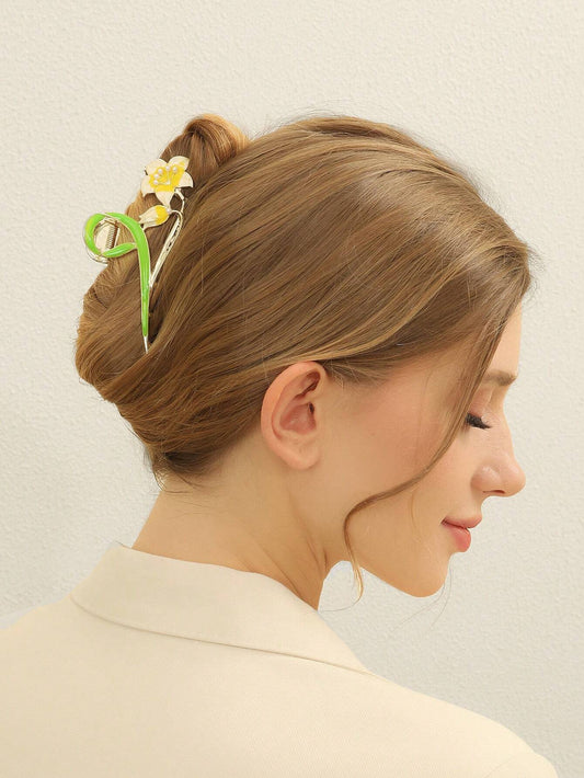 Gylden HÄrklemme med Gul Blomst