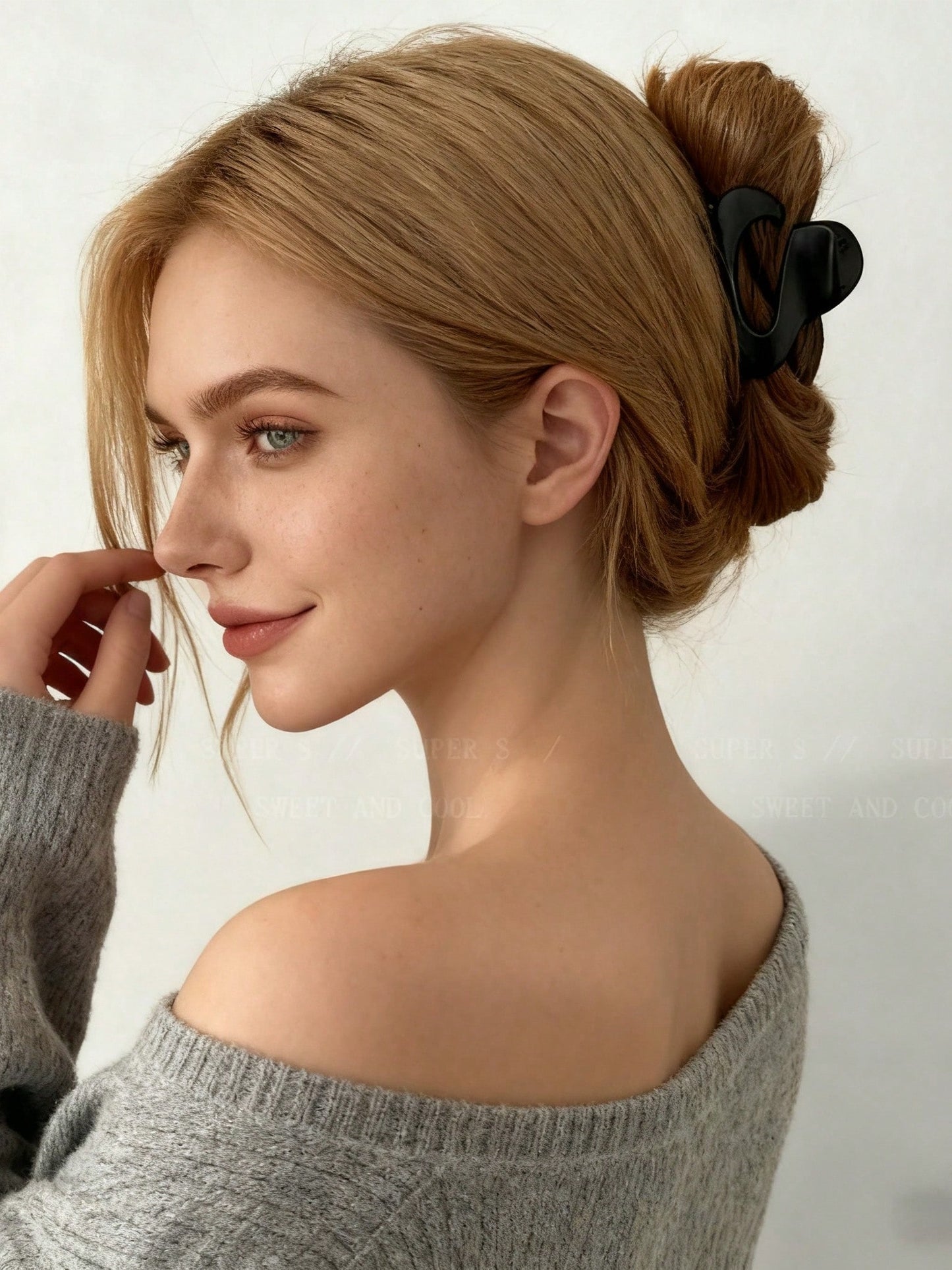 Sort Hårklemme i Asymmetrisk Design