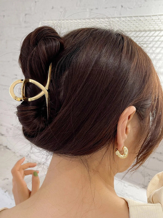 Gylden Metal-HÄrklemme med Snoning - SofiaGaver.dk