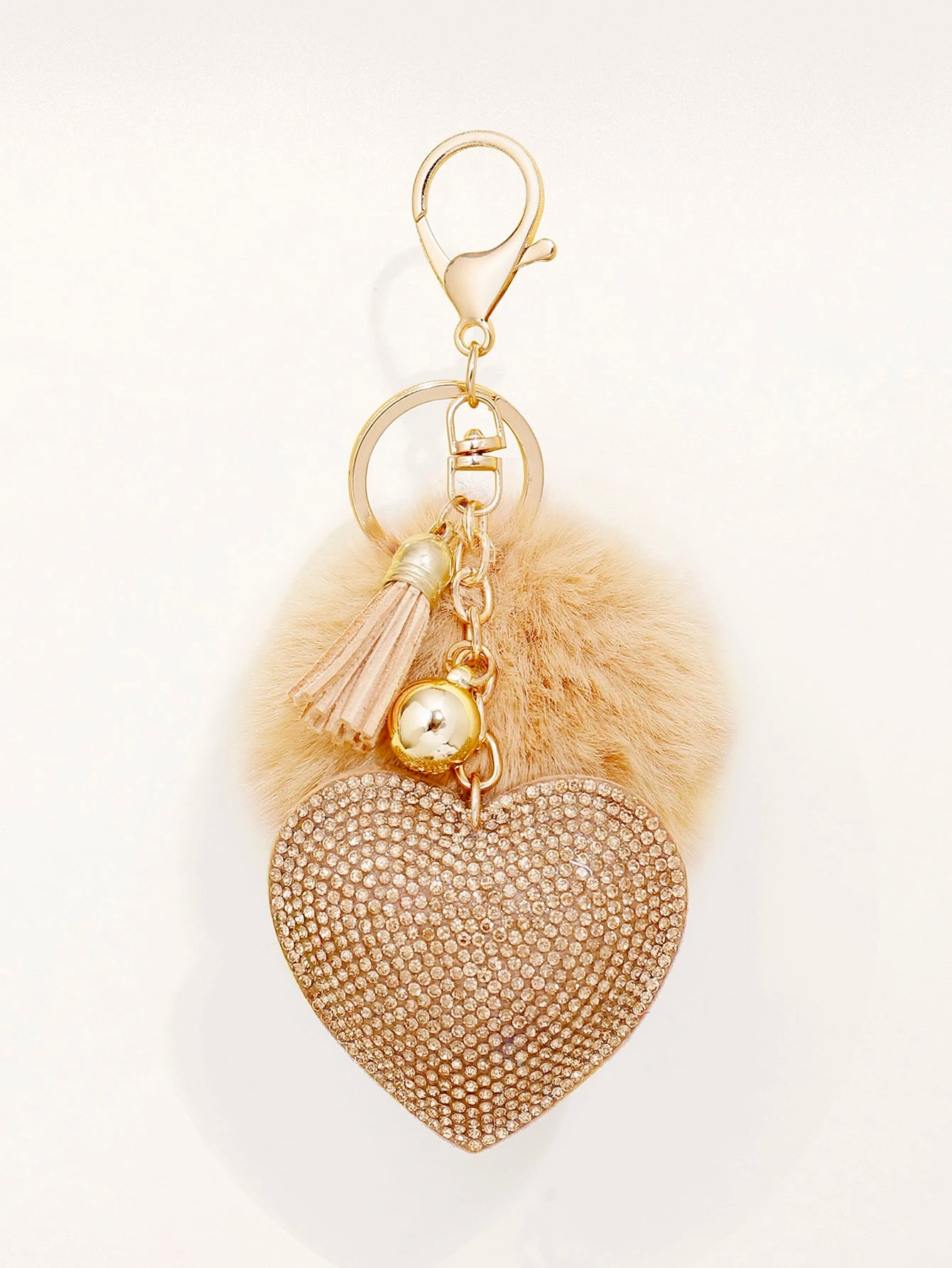 Nøglering med Glansfuld Hjerte, Klokke, Tassel & Pom Pom - i Gylden