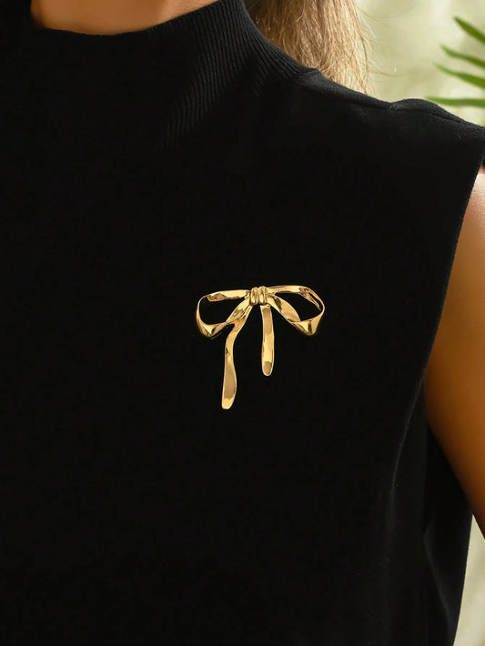 Gylden Broche med Sløjfe