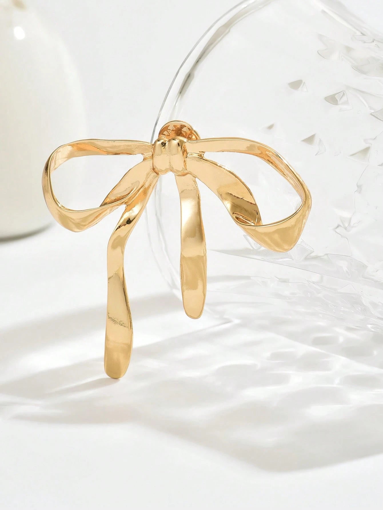 Gylden Broche med Sløjfe