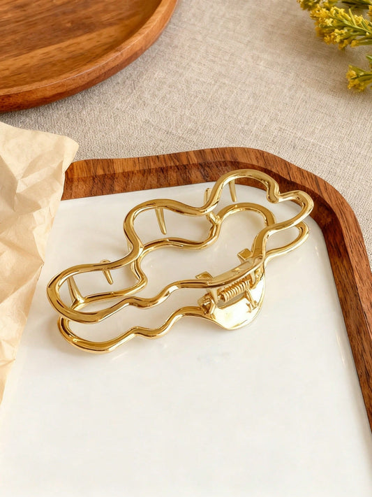 Gylden Hårklemme i Bølget Design 